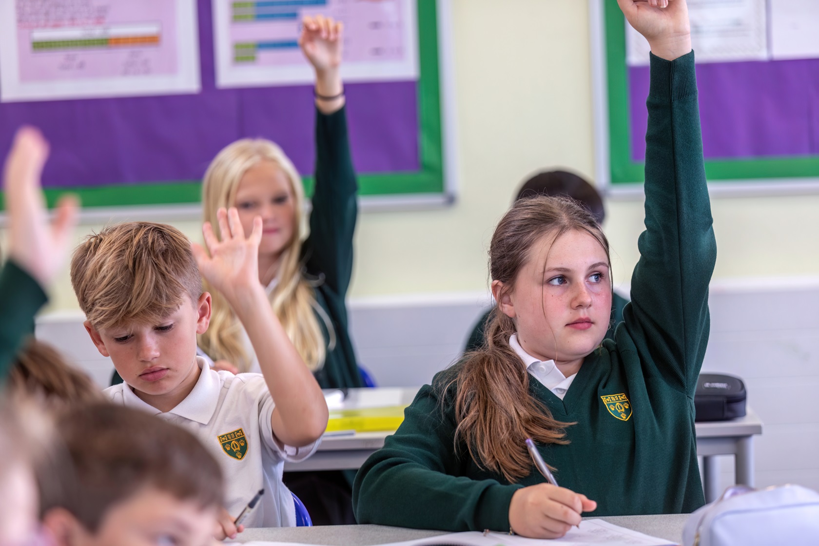 A photo of students working in the classroom